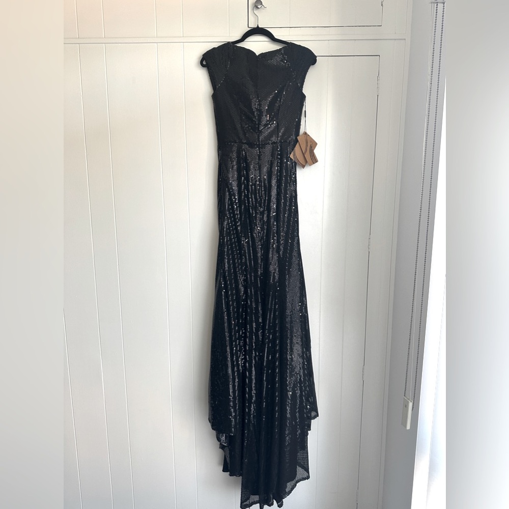 Beautiful dress , new with tags for prom pr night out .